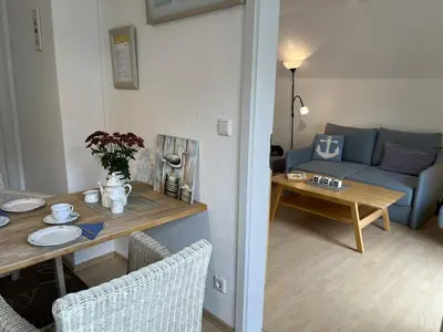 Ein Sitzbereich in der Unterkunft Wohnung Alkersum