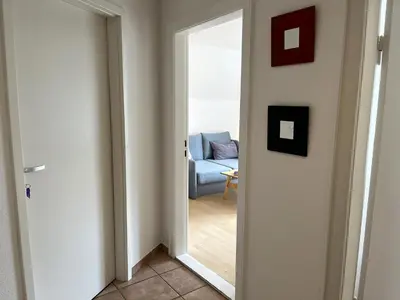 Ein Sitzbereich in der Unterkunft Wohnung Alkersum
