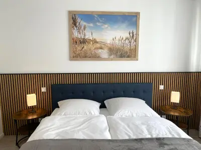 Ein Bett oder Betten in einem Zimmer der Unterkunft Nordstrand