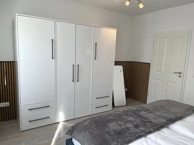 Ein Bett oder Betten in einem Zimmer der Unterkunft Nordstrand