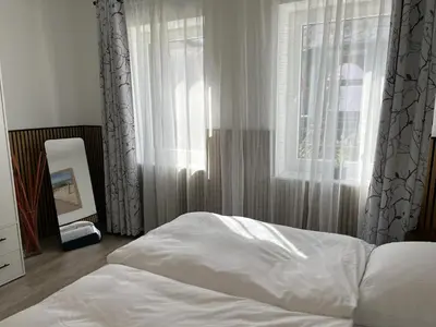 Ein Bett oder Betten in einem Zimmer der Unterkunft Nordstrand