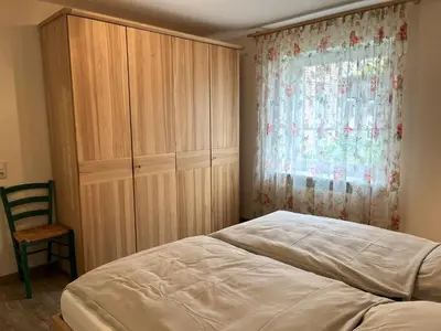 Ein Bett oder Betten in einem Zimmer der Unterkunft Dwarslöper
