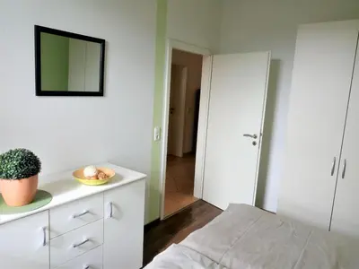 Ein Bett oder Betten in einem Zimmer der Unterkunft Wohnung List