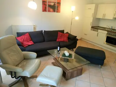 Ein Sitzbereich in der Unterkunft Wohnung List