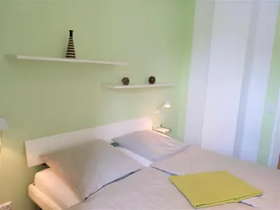 Ein Bett oder Betten in einem Zimmer der Unterkunft Wohnung Sylt