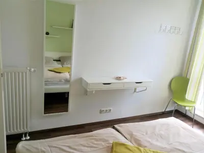 Ein Bett oder Betten in einem Zimmer der Unterkunft Wohnung Sylt