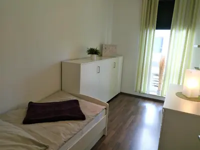 Ein Bett oder Betten in einem Zimmer der Unterkunft Wohnung Sylt