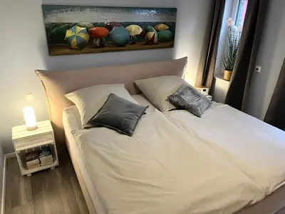 Ein Bett oder Betten in einem Zimmer der Unterkunft Spinnaker