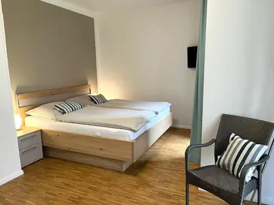 Ein Bett oder Betten in einem Zimmer der Unterkunft Lenia 1