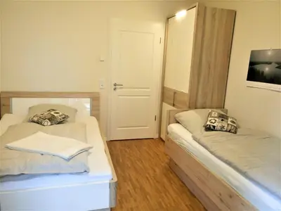 Ein Bett oder Betten in einem Zimmer der Unterkunft Lenia 2