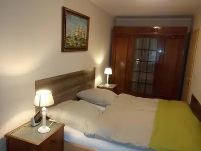 Ein Bett oder Betten in einem Zimmer der Unterkunft Whg 5