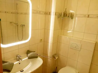 Ein Badezimmer in der Unterkunft Whg 6