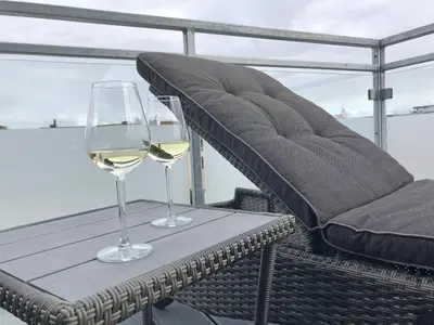 Ein Sitzbereich in der Unterkunft Penthouse meertied
