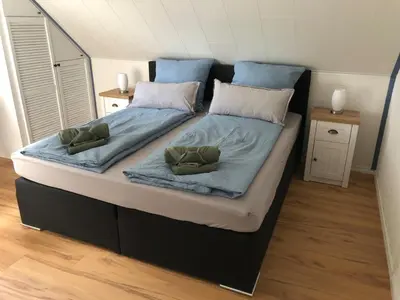 Ein Bett oder Betten in einem Zimmer der Unterkunft Moin Urlaub! Am alten Hafen