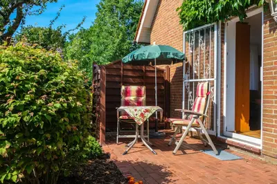 Ein Garten an der Unterkunft Ferienwohnung Herzmuschel