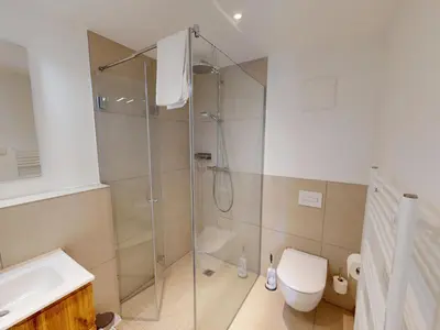 Ein Badezimmer in der Unterkunft Lighthouse Duhner Spitze - W01