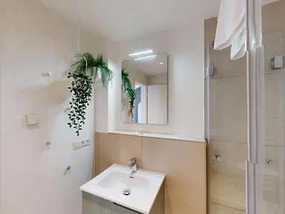 Ein Badezimmer in der Unterkunft Lighthouse Duhner Spitze - W03