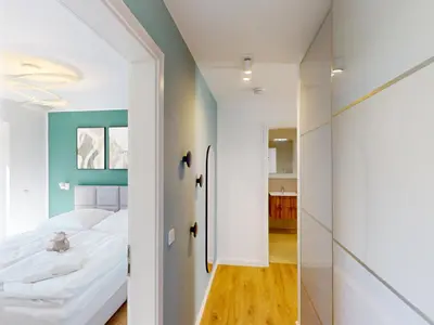 Ein Bett oder Betten in einem Zimmer der Unterkunft Lighthouse Duhner Spitze - W05