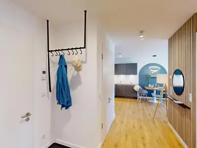 Ein Bett oder Betten in einem Zimmer der Unterkunft Lighthouse Duhner Spitze - W04