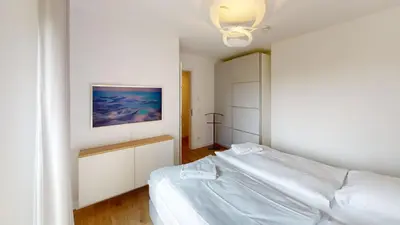 Ein Bett oder Betten in einem Zimmer der Unterkunft Lighthouse Duhner Spitze - W06