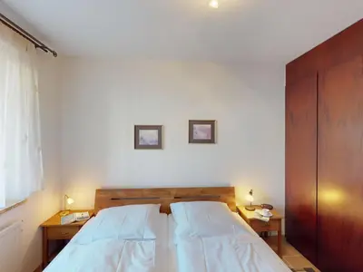Ein Bett oder Betten in einem Zimmer der Unterkunft Medemsand - 202