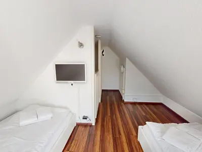 Ein Bett oder Betten in einem Zimmer der Unterkunft Gorch Fock - 11