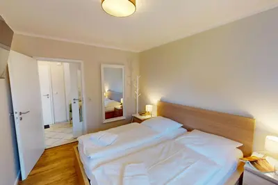 Ein Bett oder Betten in einem Zimmer der Unterkunft Anlage Am Wehrberg - 22D