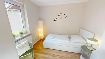 Ein Bett oder Betten in einem Zimmer der Unterkunft Anlage Am Wehrberg - 22D