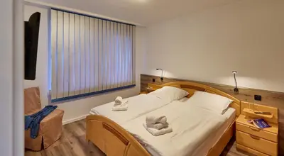 Ein Bett oder Betten in einem Zimmer der Unterkunft Ernst-Gock-Weg 53
