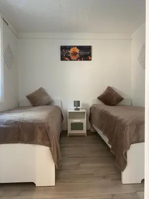 Ein Bett oder Betten in einem Zimmer der Unterkunft Ferienhaus Zur Waldfee