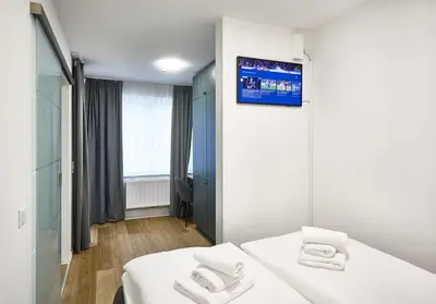 Ein Bett oder Betten in einem Zimmer der Unterkunft Northside I - Evergreen