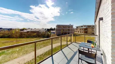 Ein Balkon oder eine Terrasse in der Unterkunft Lighthouse Duhner Spitze - W07