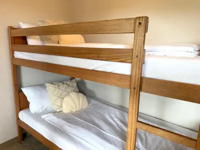 Ein Bett oder Betten in einem Zimmer der Unterkunft Apartmenthaus Frauenpreiss FeWo 214