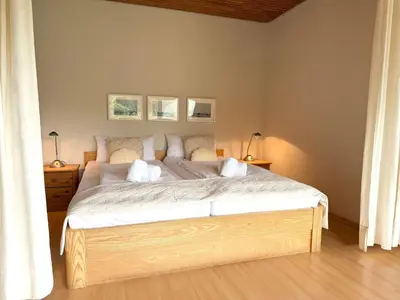 Ein Bett oder Betten in einem Zimmer der Unterkunft Apartmenthaus Frauenpreiss FeWo 214