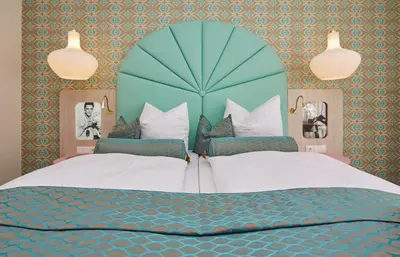 Ein Bett oder Betten in einem Zimmer der Unterkunft Bernstein Hotel 