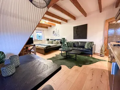 Ein Sitzbereich in der Unterkunft Ferienwohnung Erholung & Meer