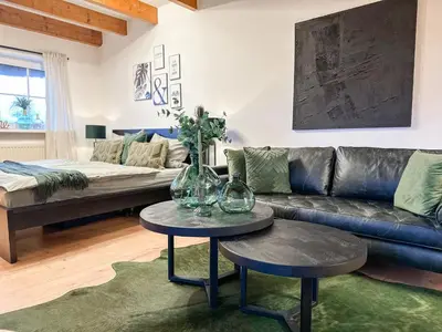 Ein Sitzbereich in der Unterkunft Ferienwohnung Erholung & Meer