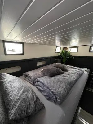 Ein Bett oder Betten in einem Zimmer der Unterkunft Anora