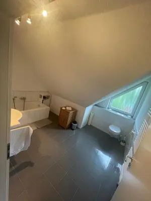 Ein Bett oder Betten in einem Zimmer der Unterkunft Ferienwohnung Koralle