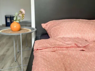 Ein Bett oder Betten in einem Zimmer der Unterkunft Brunsbüttel City Apartments