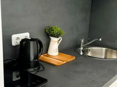 Küche/Küchenzeile in der Unterkunft Brunsbüttel City Apartments