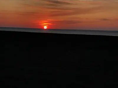 Blick auf den Sonnenuntergang/Sonnenaufgang von der Ferienwohnung aus oder aus der Nähe