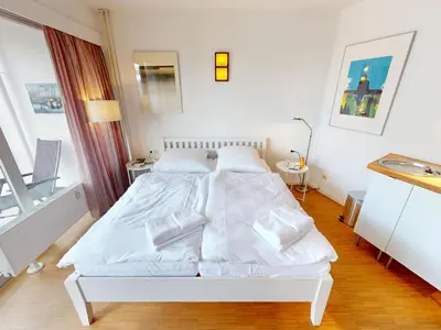 Ein Bett oder Betten in einem Zimmer der Unterkunft Seehütte - 304