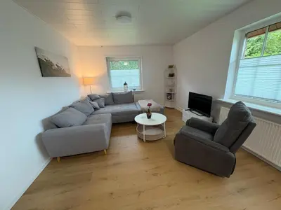 Ein Sitzbereich in der Unterkunft Ferienhaus Helserdeich - Urlaub zwischen Brunsbüttel und Friedrichskoog