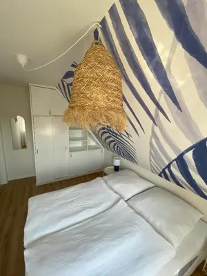Ein Bett oder Betten in einem Zimmer der Unterkunft Küstenbutze Büsum