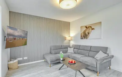Ein Sitzbereich in der Unterkunft Modernes Ferienhaus Mit Sauna