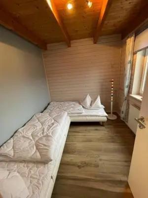 Ein Bett oder Betten in einem Zimmer der Unterkunft Nordsee