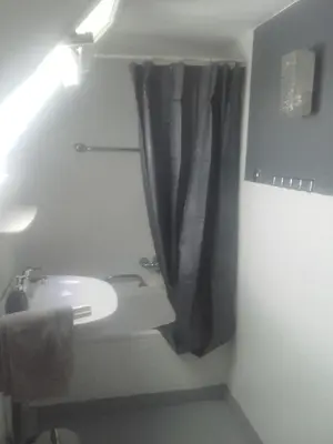 Ein Badezimmer in der Unterkunft HuPes-Ferienhaus