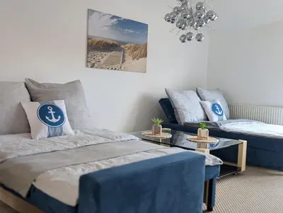 Ein Bett oder Betten in einem Zimmer der Unterkunft Ferienlodge Ankerglück