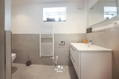 Ein Badezimmer in der Unterkunft 